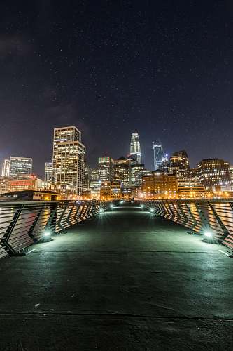 building cityscape photo near bridge urban